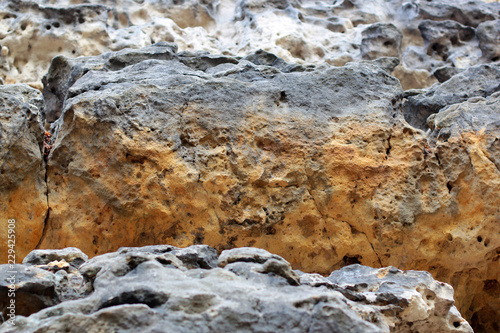 Rock layers - a colorful formations of rocks stacked over the hundreds of years. Interesting background with fascinating texture.