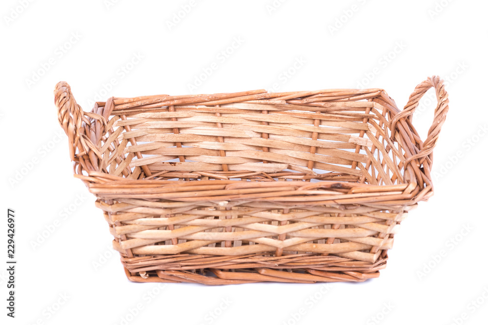small wooden basket on a white background
