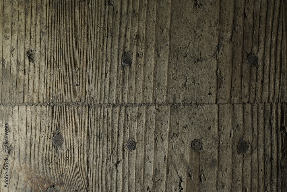 Obraz premium old wooden background with nails