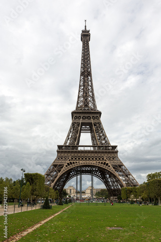 Beautiful view of the Eiffel Tower in the city of Paris on cloudy day.