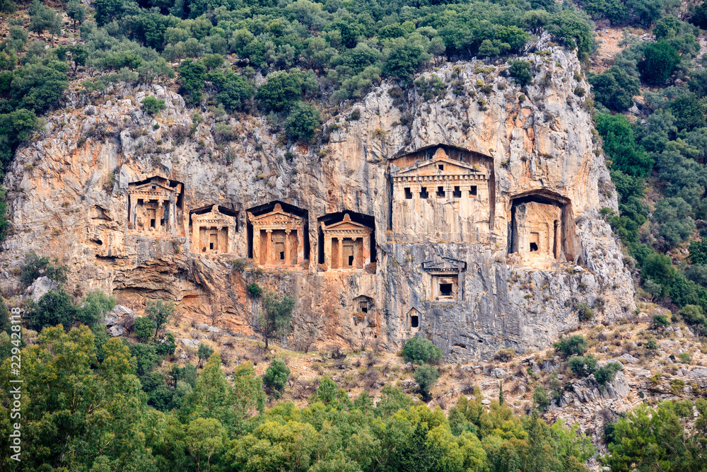 Ancient lycian Myra rock tomb ruins in Demre, Antalya.