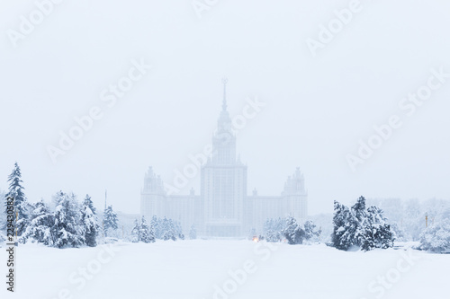 Heavy snowfall in Moscow. houses and streets during blizzard
