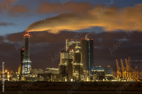 Coal powered electricity plant at night photo