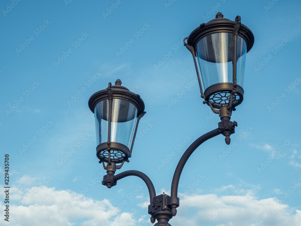 Double retro lantern on the background of the sky Krasnaya Polyana Sochi 09/29/2018 Double retro lantern on the background of the sky Krasnaya Polyana Sochi 09/29/2018