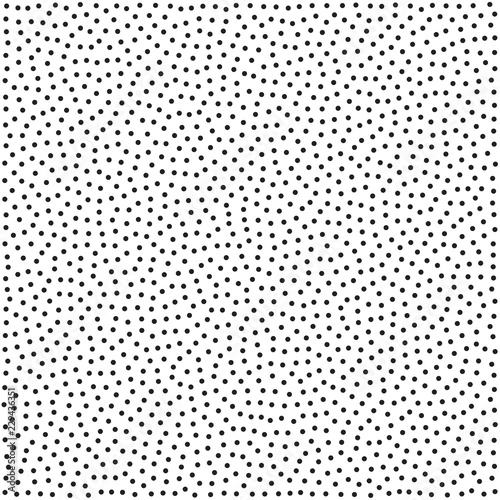 Halftone dotted background vector pattern. Chaotic circle dots isolated on the white background. Seamless asymmetrical pattern