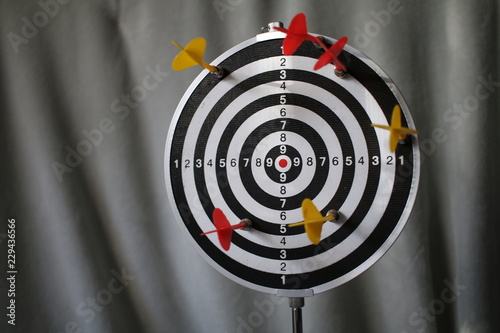 trying to hit the dartboard