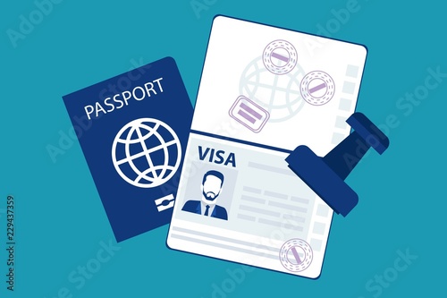 Passport with biometric data and visa stamps on it isolated on blue