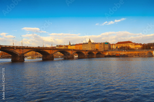 Prague city, embankment along the Vltava, reflected in the water