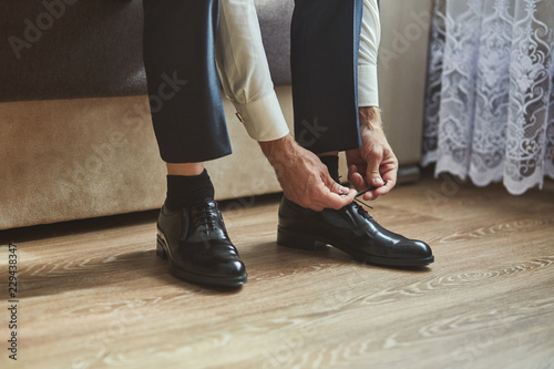 businessman clothes shoes, man getting ready for work,groom morning before wedding ceremony
