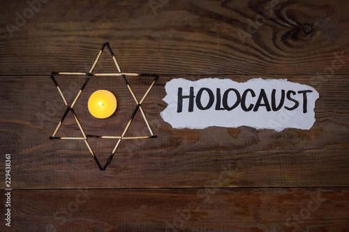 Holocaust Remembrance Day. Star of David made of matches. photo