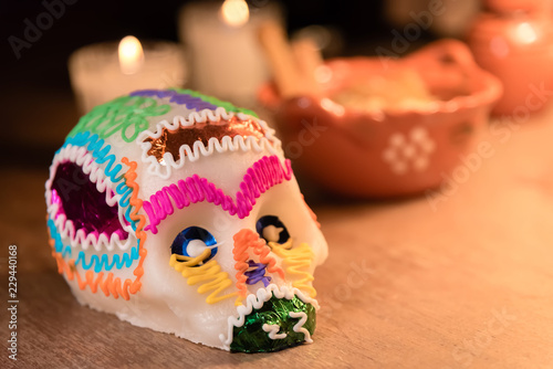 Sugar skull and light candles - Calaverita de azucar Dia de muertos