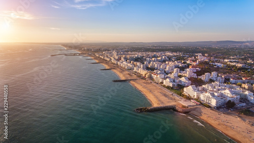 Aerial. Landscape from the sky of the beaches of the Algarve Quarteira Vilamoura. photo