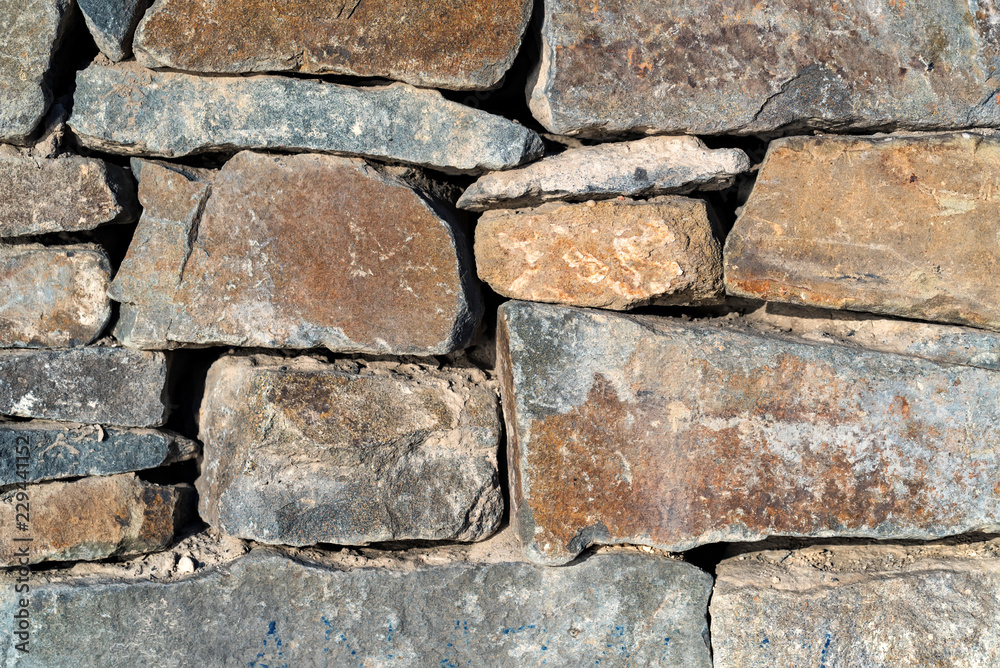 Close up image of old stone wall texture Close up image of old stone wall texture