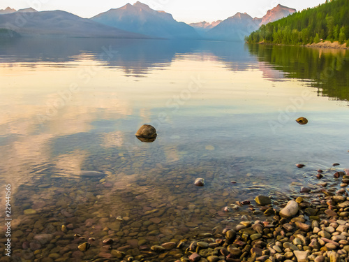 Two Medicine Lake and Mount Sinopah on background at sunset, Glacier National Park, Montana, United States. photo