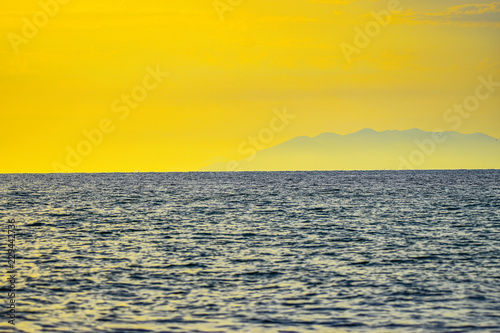 sunset over sea in Tuscany