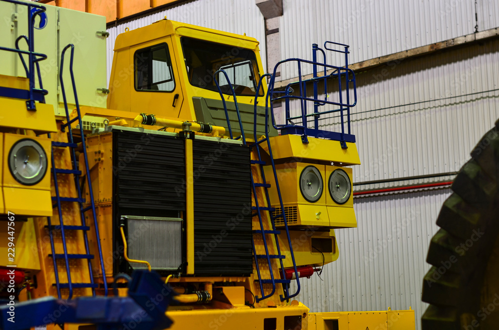 The production process of assembling career heavy mining dump trucks on a conveyor line at the automobile plant Belaz in the Republic of Belarus. Zhodino