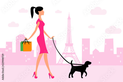 Woman walking with dog in Paris