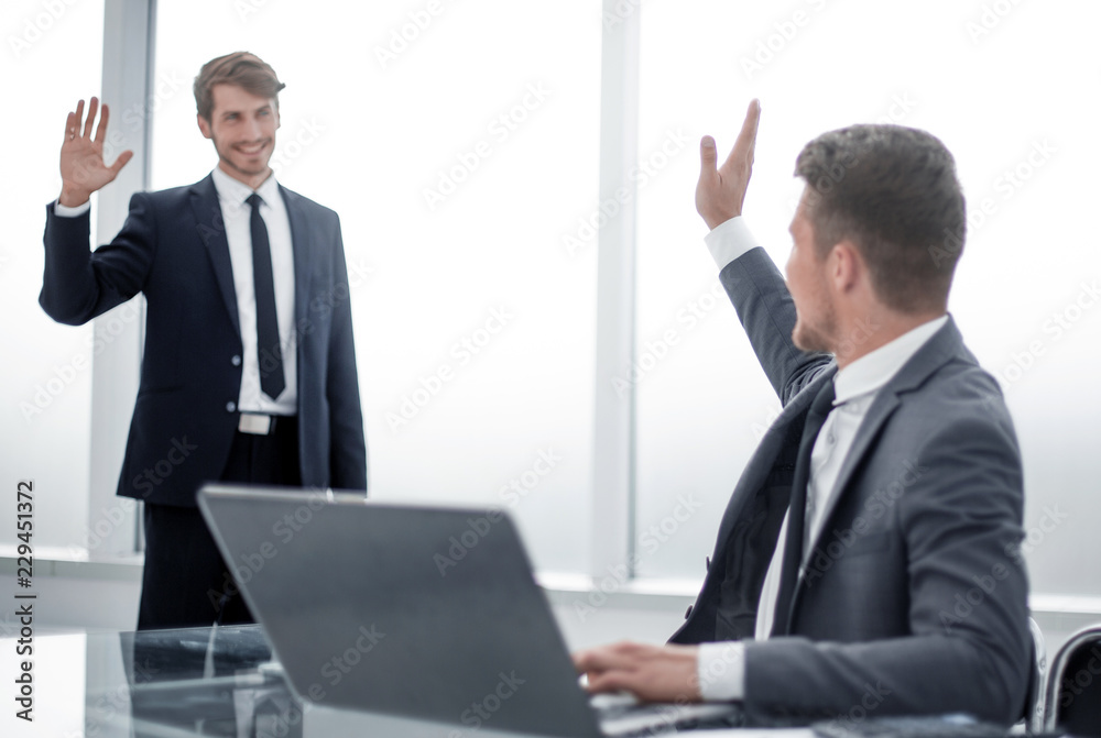 Fototapeta premium businessman greets colleague