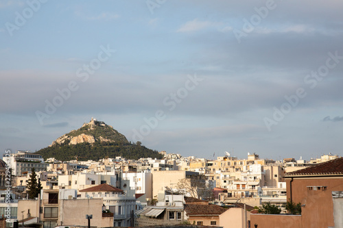 Town in Greece with mountain in the baground photo