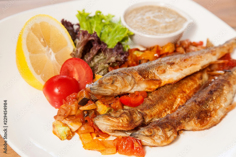 Fried fish with vegetables