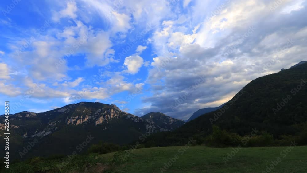 Time lapse of clouds moving in sky with Pyrenean countryside in Aude, Languedoc in Southern France Time lapse of clouds moving in sky with Pyrenean countryside in Aude, Languedoc in Southern France