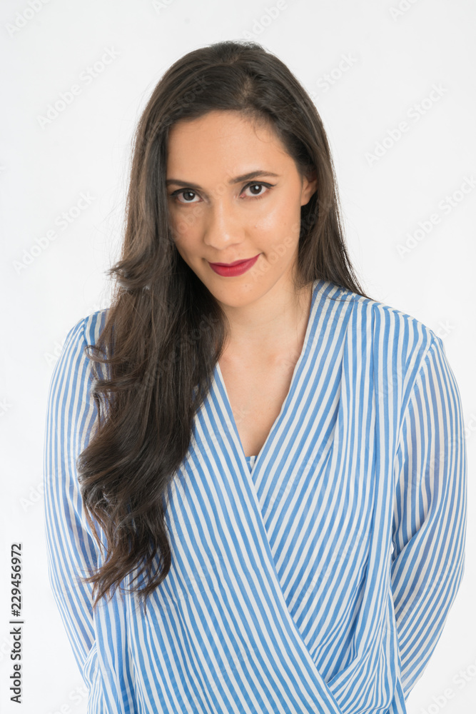 Woman smiling like flirting with head slightly down but looking up to camera Woman smiling like flirting with head slightly down but looking up to camera