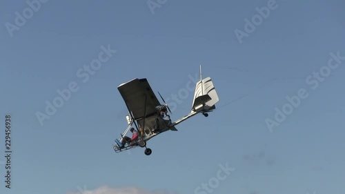Hanggliders launching from a perch or towed by small motorized air craft. Hanggliders flying