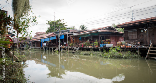 Houses on canal in Thailand