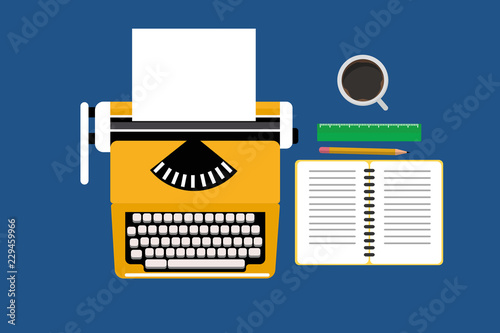Typewriter and notepad with supplies