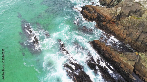 Aerial view over the wild Atlantic Ocean in Ireland © 4kclips