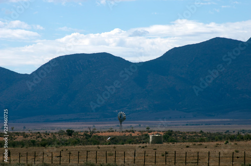 Wind mill seen on Moralana Scenic Drive, Flinders' Ranges, SA, Australia photo