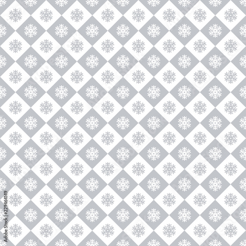 Seamless Christmas wrapping paper pattern. Christmas snowflake and check pattern.