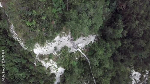 Aerial top view of Sugana Valley, with drone rotating while ascending photo