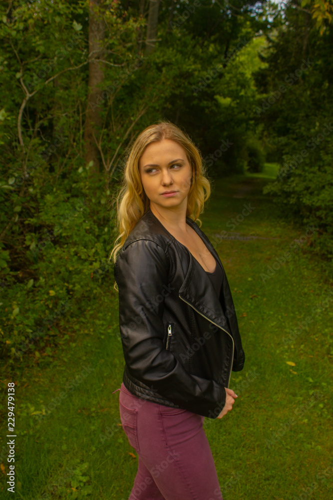 Fall woman in jacket in park Fall woman in jacket in park