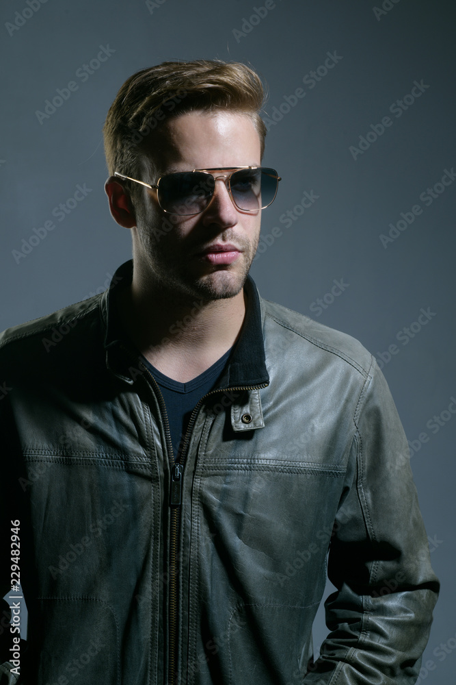 Glasses do more than improve your vision. Handsome man wear eye glasses. Fashion eyewear. Fashion model in trendy sun glasses. Man of fashion. Adding a delicate finishing touch to your outfits Glasses do more than improve your vision. Handsome man wear eye glasses. Fashion eyewear. Fashion model in trendy sun glasses. Man of fashion. Adding a delicate finishing touch to your outfits