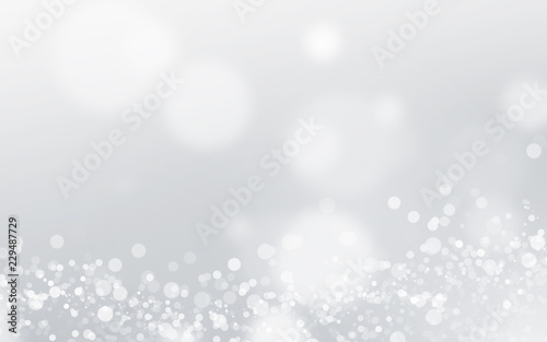 Silver light background with blur bokeh. beautiful christmas backdrop. festive defocused. cosmetic advertising design