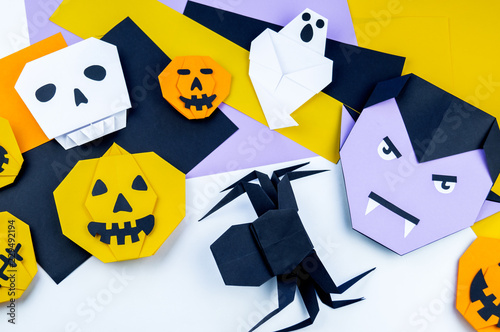 Fototapeta Naklejka Na Ścianę i Meble -  Origami Halloween. Copy spase. White background