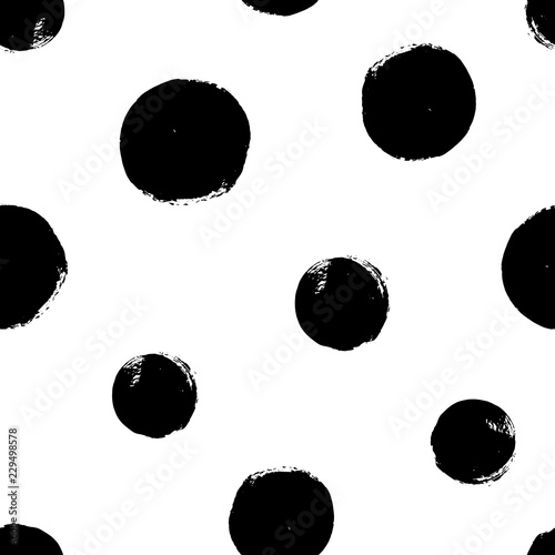 Hand drawn seamles pattern with textured circles. Uneven polka dot design, Vector illustration.