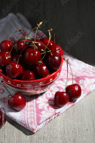 A bowl with ripe cherry