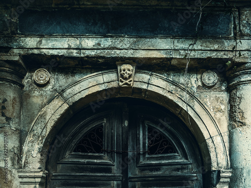 Valokuva Old crypt entrance with death signs
