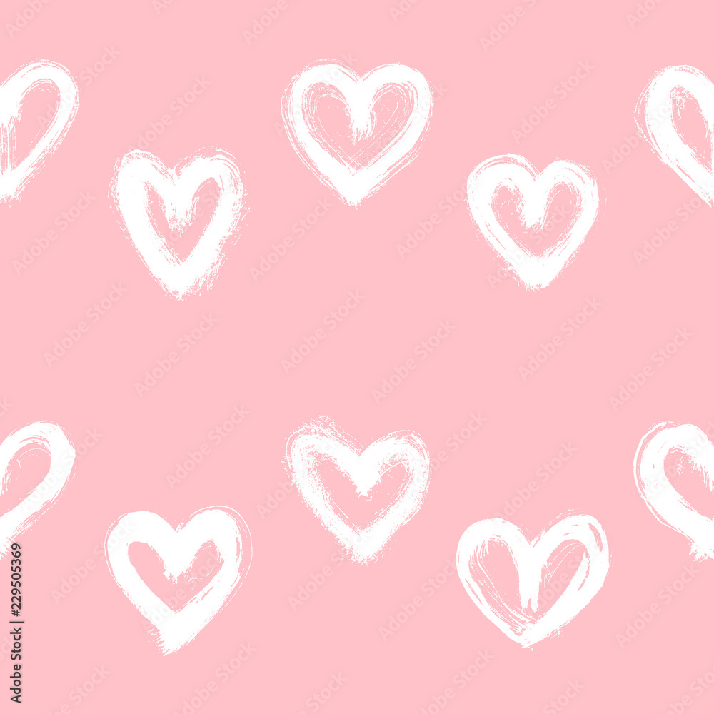 Seamless pattern with white hand-drawn uneven hearts isolated on pale pink background. Ink doodle style abstract grunge texture.