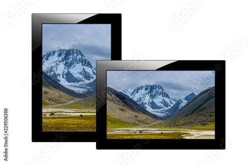 Modern black tablet computer isolated on white background. Tablet pc and screen with Image of mountains.
