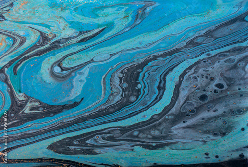 Marble abstract acrylic background. Blue marbling artwork texture.