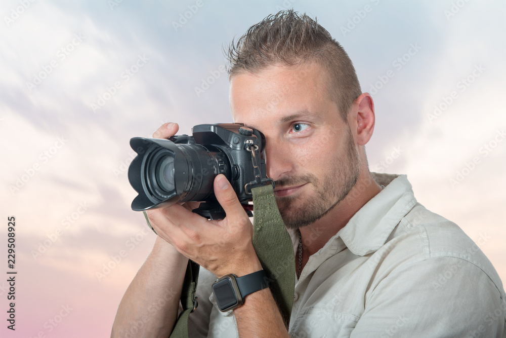 young man photographer with dslr camera young man photographer with dslr camera