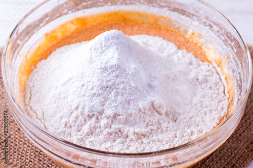 Flour in a bowl with dough