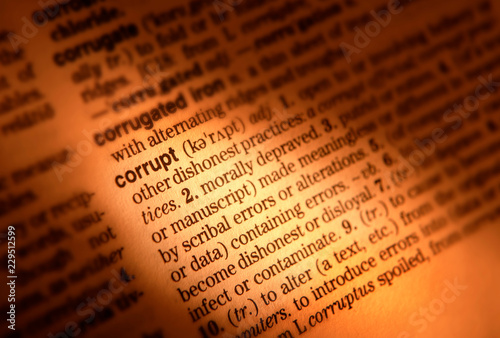 Принти на полотні CLOSE UP OF DICTIONARY PAGE SHOWING DEFINITION OF THE WORD CORRUPT