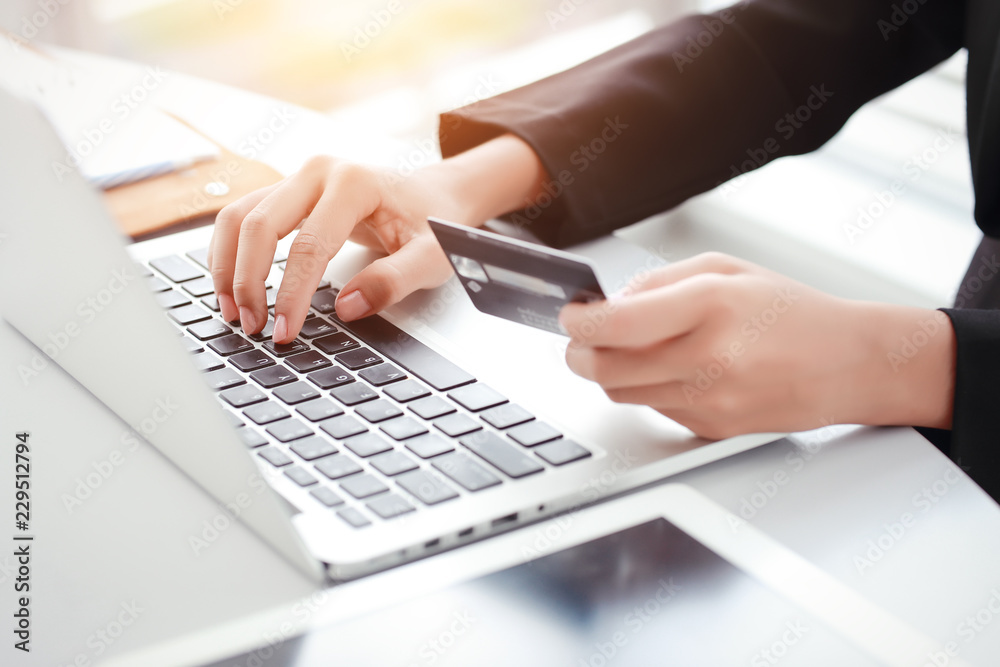 shopping and online payment by using laptop computer and tablet with credit card shopping and online payment by using laptop computer and tablet with credit card