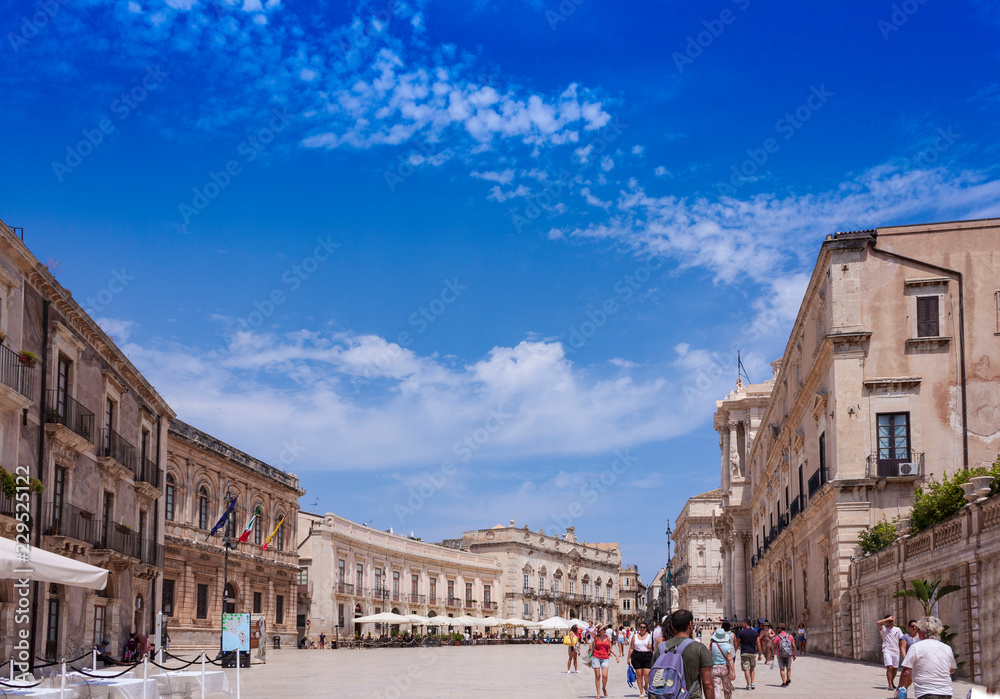 Siracusa, Sicily – august 12, 2018: Tourists visiting the famous Square Duomo on Ortygia Island 