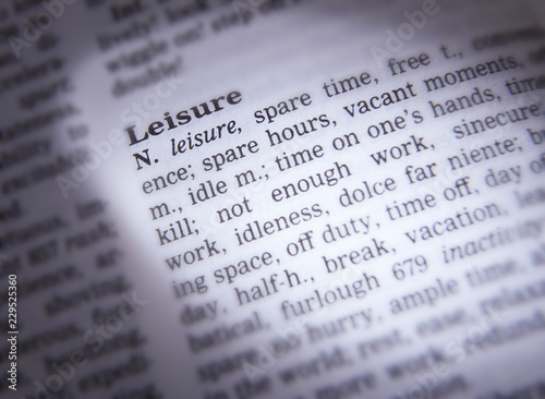 DICTIONARY PAGE SHOWING DEFINITION OF THE WORD LEISURE