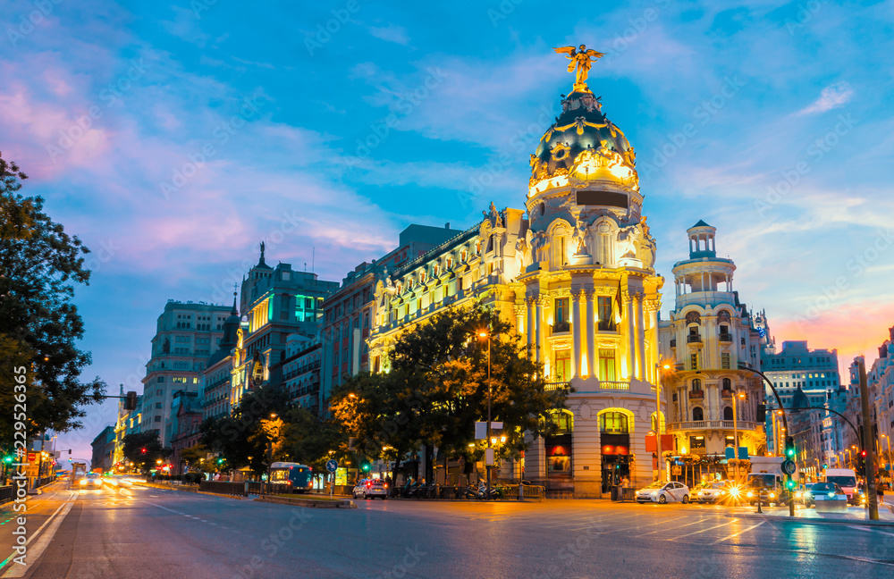 Madrid city skyline gran via street twilight , Spain